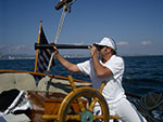 Captain Mack keeping a lookout sailing in Santa Monica Bay
